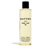 8 ounce bottle of BUTTER elixir body+hair Oil